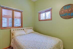 Cozy Cottage w/ Sunroom - Walk to Higgins Lake!