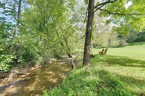Cozy Creekside Cabin w/ Fire Pit & Views!