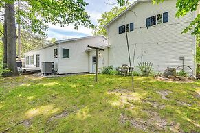Waterfront Gladwin Home w/ Deck + Fire Pit!