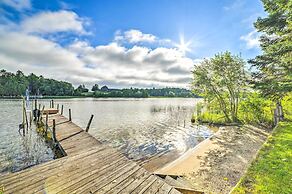 Riverfront Home w/ Dock ~ 6 Mi to Cheboygan!