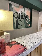 Olive Zip Indiranagar Metro by Embassy Group