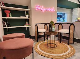 Olive Zip Indiranagar Metro by Embassy Group