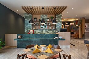 MaxOneHotels Kota Harapan Indah Bekasi