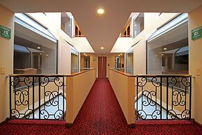 Hotel Windsor House Inn By GEH Suites