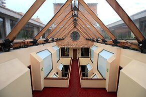 Hotel Windsor House Inn By GEH Suites