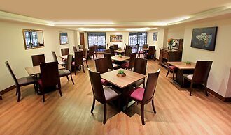 Hotel Windsor House Inn By GEH Suites