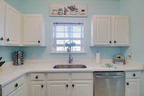 Condo at Barefoot Golf Resort w/ Shuttle to Beach!