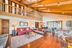 Lakefront Harrison Home w/ Sunroom, Deck, & Dock!