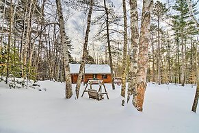 Cozy Manistique Cabin w/ Deck, Grill & Fire Pit!