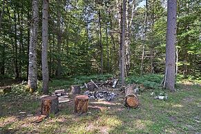 Cozy Manistique Cabin w/ Deck, Grill & Fire Pit!