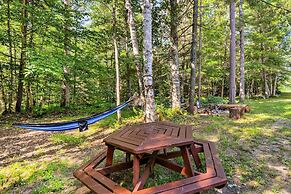 Cozy Manistique Cabin w/ Deck, Grill & Fire Pit!