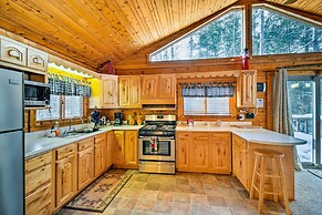 Cozy Manistique Cabin w/ Deck, Grill & Fire Pit!