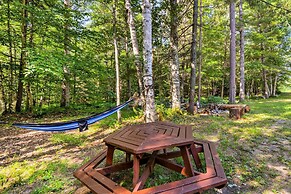 Cozy Manistique Cabin w/ Deck, Grill & Fire Pit!
