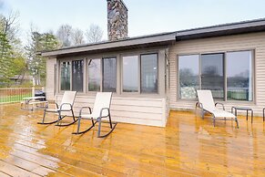 Cadillac Vacation Rental w/ Dock on Lake Mitchell!