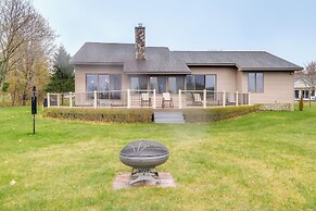 Cadillac Vacation Rental w/ Dock on Lake Mitchell!