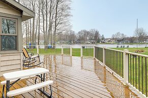 Cadillac Vacation Rental w/ Dock on Lake Mitchell!