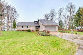 Cadillac Vacation Rental w/ Dock on Lake Mitchell!