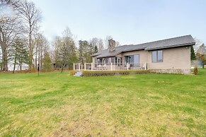 Cadillac Vacation Rental w/ Dock on Lake Mitchell!