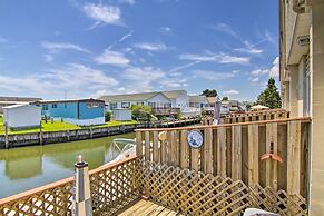 Deck w/ Canal Access: Ocean City Townhome