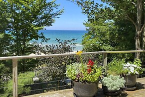 Forested Pentwater Vacation Rental - Walk to Beach