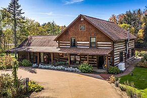 Log Cabin on the Wolf River w/ Private Hot Tub!