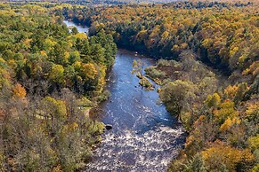 Log Cabin on the Wolf River w/ Private Hot Tub!