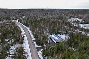 Serene Presque Isle Harbor Home on Sunrise Side!