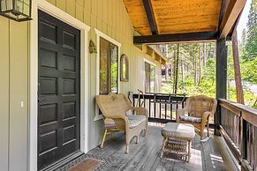 Cabin w/ Deck & Fire Pit in Blue Lake Springs!