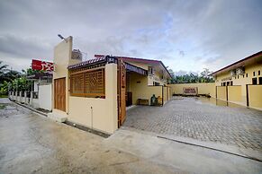 OYO 90773 Shine Guest House Syariah