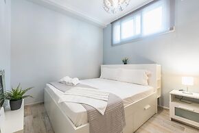 Welcoming Koukaki Home by Cloudkeys