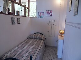 Apartment Immersed in a Large Garden Park Residence Cicladi