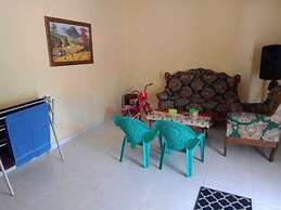 SPOT ON 91371 Wisma Nadira Near SPBU PT. Trijaya Pugung PENENGAHAN