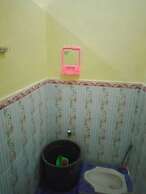 SPOT ON 91371 Wisma Nadira Near SPBU PT. Trijaya Pugung PENENGAHAN