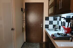 Homey And Cozy Studio Room At Suites @Metro Apartment