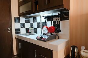 Homey And Cozy Studio Room At Suites @Metro Apartment