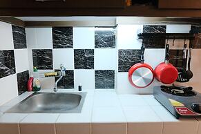 Homey And Cozy Studio Room At Suites @Metro Apartment