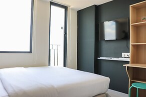 Tranquil And Minimalist Studio At Osaka Riverview Pik 2 Apartment