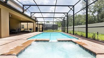 Stunning 9BR Villa w South-facing Pool Near Disney