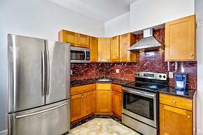 Retreat in a Stylish 2BD Apartment in the Heart of the City