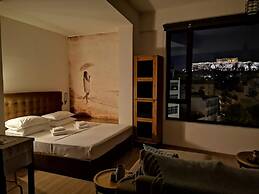 Explore Nightlife Near an Apartment With an Acropolis View