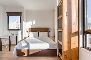 Explore Nightlife Near an Apartment With an Acropolis View