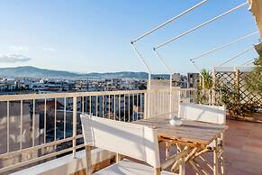 Explore Nightlife Near an Apartment With an Acropolis View