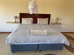 Nyanga Home set in a Secure Private Village - 2033