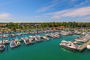 Elk Rapids Condo w/ Balcony Overlooking Elk Lake!