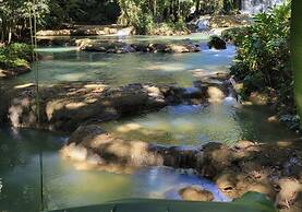 Seacret Studios - Cozy Jamaican Retreat Apts by RedAwning