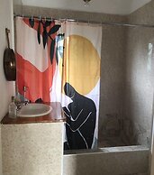 Seacret Studios - Cozy Jamaican Retreat Apts by RedAwning