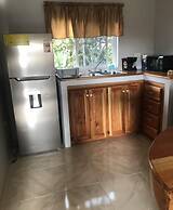 Seacret Studios - Cozy Jamaican Retreat Apts by RedAwning