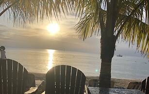 Seacret Studios - Cozy Jamaican Retreat Apts by RedAwning