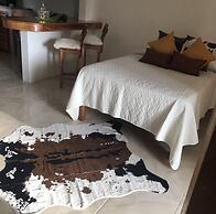 Seacret Studios - Cozy Jamaican Retreat Apts by RedAwning