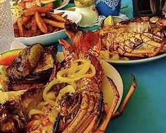 Seacret Studios - Cozy Jamaican Retreat Apts by RedAwning